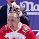 Joey Chestnut celebrating after competitive eating win